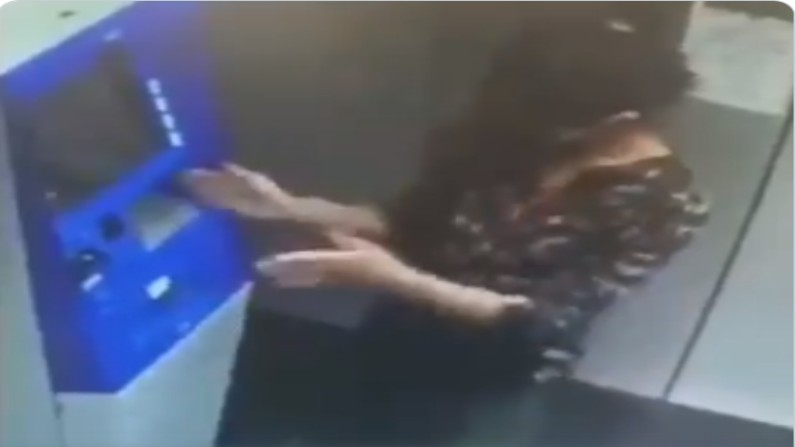 girl withdrawing cash from ATM Hilarious way