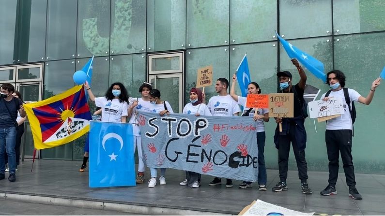 People took to the streets of France against China's atrocities on the Uighur community, showed the banner of 'Terrorist China'